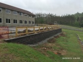 Site retaining wall and railing